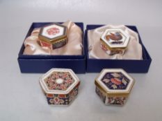 FOUR ROYAL CROWN DERBY HEXAGONAL LIDDED TRINKET POTS, comprising two boxed examples A 1299, A 1295
