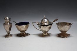 A HALLMARKED SILVER FOUR PIECE CRUET SET - BIRMINGHAM 1917, consisting of mustard, two salt