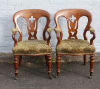 A PAIR OF 19TH CENTURY OAK ARMCHAIRS, having pierced splat back, scroll arms with upholstered