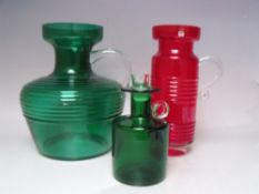A RIIHIMAEN LASI KLEOPATRA GREEN GLASS JUG, with clear glass loop handle, designed by Tamara Aladin,