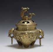 AN ORIENTAL LIDDED BRASS CENSOR, H 24 cm
