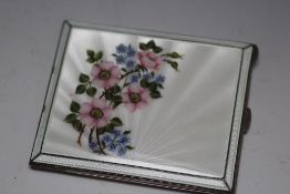A HALLMARKED SILVER AND FLORAL DESIGN GUILLOCHE ENAMEL CIGARETTE CASE BY MAPPIN AND WEBB -
