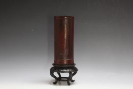 A CARVED CHINESE BRUSH POT, on a matched stand, H 28.5 cm