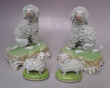 A PAIR OF DRESDEN CERAMIC DOG FIGURES, together with a smaller pair of Dresden sheep figures,