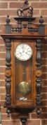 A 19TH CENTURY MAHOGANY VIENNA WALLCLOCK, with rearing horse surmount, the enamel dial with Roman