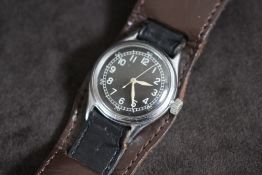 A BULOVA MILITARY A-11 TYPE WRIST WATCH, stamped spec no94-27834-B serial NO AF 44169179, PART NO 10