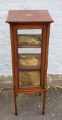 AN EDWARDIAN CARVED MAHOGANY INLAID SQUARE DISPLAY CABINET, glazed to all sides with inlaid