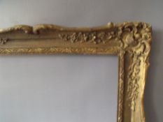 A LATE 19TH CENTURY / EARLY 20TH CENTURY GOLD SWEPT FRAME, frame W 7 cm, frame rebate 92 x 61 cm