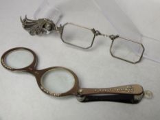 A PAIR OF VINTAGE WHITE METAL FOLDING LORGNETTES, with marcasite embellishment, together with a pair