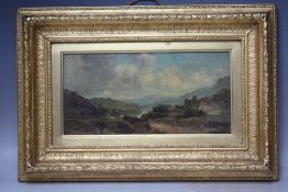 ALFRED H VICKERS (1853-1907). Stormy wooded mountainous land lake scene with cottages, signed