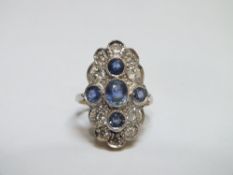 A SAPPHIRE AND DIAMOND RING, set with ten brilliant cut diamonds and five sapphires, hallmarks