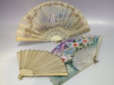 AN ANTIQUE CARVED BONE / IVORY HAND PAINTED FOLDING FAN, L 19 cm, together with a smaller plain