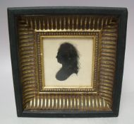 J.M. Silhouette miniature of a Georgian lady, signed with initials and dated 1830 lower middle to