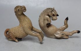 TWO UNUSUAL MINIATURE CRACKLE GLAZE TANG HORSES, one modelled seated with hooves flailing, the other