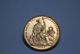 A 1968 LIMA MINT PERUVIAN 50 SOL GOLD COIN, approximately 9.3 g