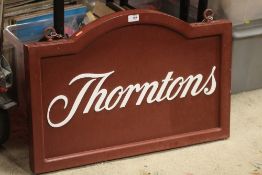A MODERN DOUBLE SIDED THORNTON'S CHOCOLATE ADVERTISING SHOP SIGN