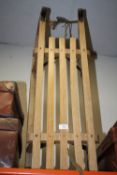 A WOODEN SLEDGE
