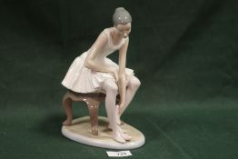 A LARGE SEATED NAO BALLERINA FIGURE