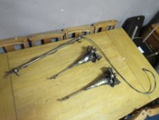 A LARGE MODERN WROUGHT CURTAIN WALL FIXING WITH TWO WALL POCKETS