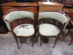 A PAIR OF EDWARDIAN MAHOGANY INLAID TUB ARM CHAIRS A/F