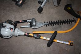 A RYOBI PETROL GARDEN MULTI TOOL