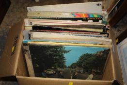 A BOX OF LP RECORDS TO INCLUDE THE BEATLES, DAVID BOWIE, THE JAM ETC.
