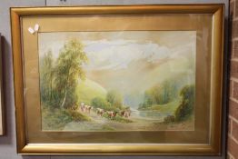 A GILT FRAMED AND GLAZED WATERCOLOUR OF A FIGURE DRIVING CATTLE TO THE STREAM, SIGNED R.E.HAGUE