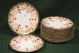 A SET OF TWELVE ROYAL CROWN DERBY PLATES