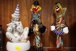 TWO MURANO STYLE STUDIO GLASS CLOWN FIGURES, TOGETHER WITH A MUSICAL CERAMIC CLOWN FIGURE (3)