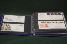 A FOLDER OF 1960S - 1980S FIRST DAY COVERS