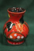 A SIGNED ANITA HARRIS ART POTTERY MUSHROOM PATTERN VASE