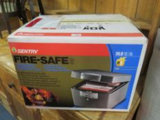 A SENTRY FIRE SAFE LOCKER IN ORIGINAL BOX H-36 W- 50 CM