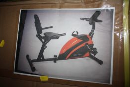 A BOXED EXERCISE MACHINE ( UNCHECKED )