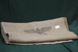 A WWII GERMAN HESSIAN SACK MARKED WITH A SWASTIKA