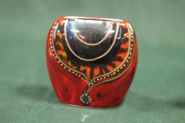 A SMALL ANITA HARRIS PURSE VASE