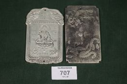 TWO ORIENTAL STYLE WHITE METAL PLAQUES/ TALISMANS