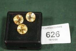 THREE ROUND CITRINE STYLE STONES