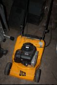 A JCB PETROL LAWNMOWER