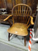 A SMALL TRADITIONAL ELM ARMCHAIR - REDUCED