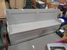 A MODERN PAINTED WOODEN SETTLE WITH LIFT-UP SEAT LIDS W- 182 CM