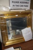 A MODERN GILT FRAMED LAURA ASHLEY WALL MIRROR