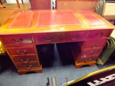 A REPRODUCTION LEATHER TOPPED TWIN PEDESTAL DESK H-75 W-122 CM