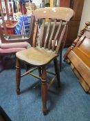 A TRADITIONAL WINDSOR STYLE HIGHCHAIR
