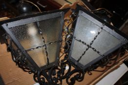 A PAIR OF METAL LANTERNS