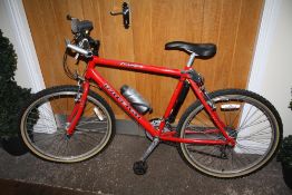 A RED RALEIGH USA DESIGN BICYCLE