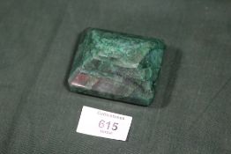 A LARGE EMERALD STYLE STONE