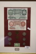 A FRAMED AND GLAZED 1950 COIN AND NOTE DISPLAY