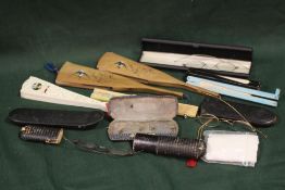 A BAG OF VINTAGE FOLDING FANS AND SPECTACLES ETC.