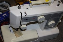 A RICCAR 650 SEWING MACHINE AND ACCESSORIES