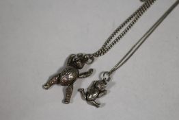 TWO ARTICULATED SILVER TEDDY BEAR PENDANTS ON CHAINS